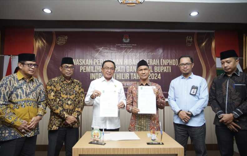 Penandatanganan NPHD Oleh Bupati H.M.Wardan Bersama KPU dan Bawaslu Inhil